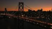 Aerials USA San Francisco Oakland Bay Bridge Sunset City Stock ...
