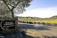 A sign welcomes visitors to the Domaine Chandon vineyard and ...