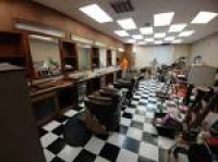 Vintage barbers specializing in flat tops, shaves and fades