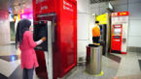 KUALA LUMPUR, MALAYSIA - CIRCA FEB 2014: Peope Use Cimb Bank ATM's ...