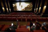 Moviegoers get pampered with oversized recliners, creative cuisine ...
