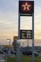 Gasoline prices are seen at Texaco and Shell gas stations al ...