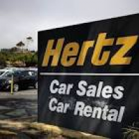 Hertz cuts 2016 outlook over US car rental revenue