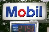 The cash price for unleaded gasoline is displayed at a Mobil ...