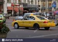 A US City yellow cab cruisng the streets of Indianapolis looking ...