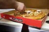 Domino's Debuts Pizza Delivery by Robot