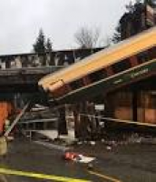 US train derails from bridge and hits motorway on first high-speed ...