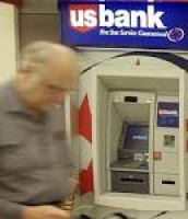 As travelers carry less cash, will ATMs at airports go the way of ...
