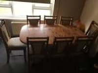 Extending-dining-table-with-8- ...