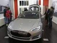 Auto dealers chief warns of Tesla direct sales model