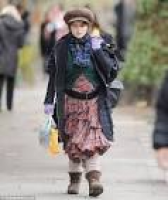 Actress Helena Bonham Carter wears several outfits at once on ...