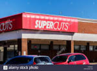 Supercuts, a beauty shop specializing in haircuts in a strip mall ...