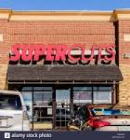 Supercuts, a beauty shop specializing in haircuts in a strip mall ...