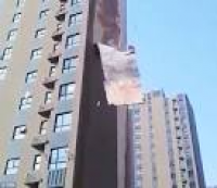 Chinese high-rise building peels away and COLLAPSES when the wind ...