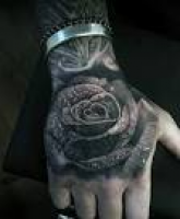 The 25+ best Rose hand tattoo ideas on Pinterest | Rose tattoo on ...