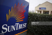 A SunTrust Banks Inc. Branch Ahead Of Earnings Figures Photos and ...